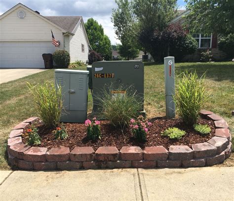 landscape ideas around electrical boxes|exterior electrical outlet boxes.